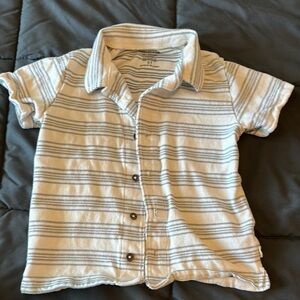Boy’s cream and light blue striped‎ button up shirt.